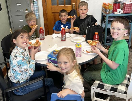 Pictured clockwise around the table from the left: Finley Mundorf, Killian Kearns, Tru Mundorf, Tate Phillips, Samuel Hessin, Brystol Call. Brett Mauler