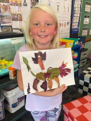 The 2nd grade students recently went on a leaf hunt to find the perfect leaves to create a leaf animal. Pictured is Daryl Deibler.