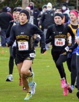 Callie Coble and Josey French start the Class D girls race.