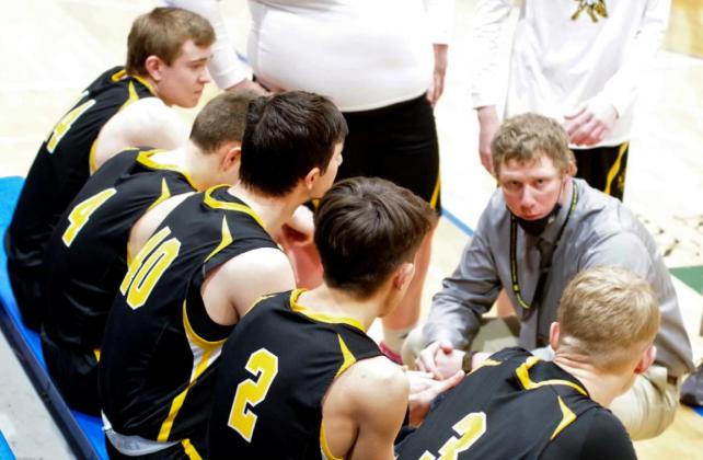 Head Coach Brad Wright talks with his starters at Gordon last Friday, l-r: Jaden Emerson, Brendon Walker, Bryce McIntosh, Trevor Kuncl and Clayton Moore. Barb McIntosh