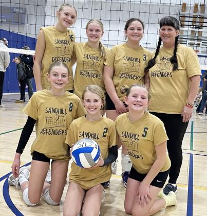 Sandhill Defenders 13U team, back l-r: Hadley Marsh (13), Ava Walz (13), Lilly Morrow of Dunning (12), Coach Barb McIntosh. Front: Kendall Phipps (12), Ayden Lee (12) &amp;amp; Ella Walz (11).