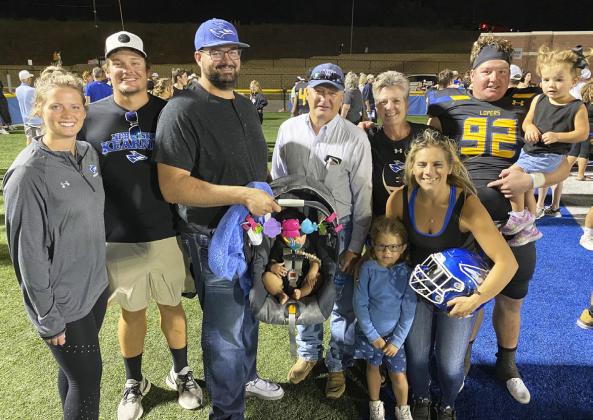 Jeff and Tammy Spies surrounded by their family, l-r: Kelsey Goodban, Tye, Jake, Charleigh, Jeff, Tammy, Rynnleigh, Breezy, Tell and Hadleigh Spies. courtesy photo