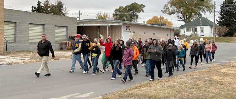 Mullen TeamMates mentors and mentees participate in the One Mile Walk last Wednesday. Kara Connealy