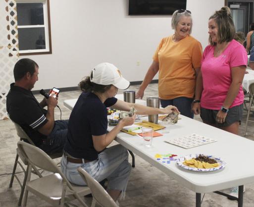 Bingo hosts Ryan and Shelby Ridenour tried to get Diana Brost and CeCe Coons (right) to have a dance off to determine the $50 final Bingo game prize winner, but despite Ryan’s stellar music choice, they decided to split the money instead. Gerri Peterson