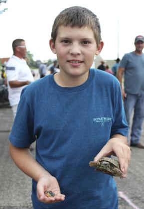 Cort Cox with his overall champion turtle. Gerri Peterson