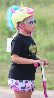 Harper Myers waiting her turn at the Bicycle Rodeo.