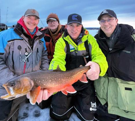Last December, Garrett Cox - Mullen, Pete Swanson - Del Rapids, S.D., Dox Cox - Mullen and Chris Bressler - Lake Benton, Minn., headed to Big Lake Alaska, targeting spawning native Artic char. There are less than 20 places in the world where native char exist, with only a handful of those places realistically accessible on ice. It was a lifetime trip, with all of them catching multiple char, plus other species like burbot and rainbow trout.