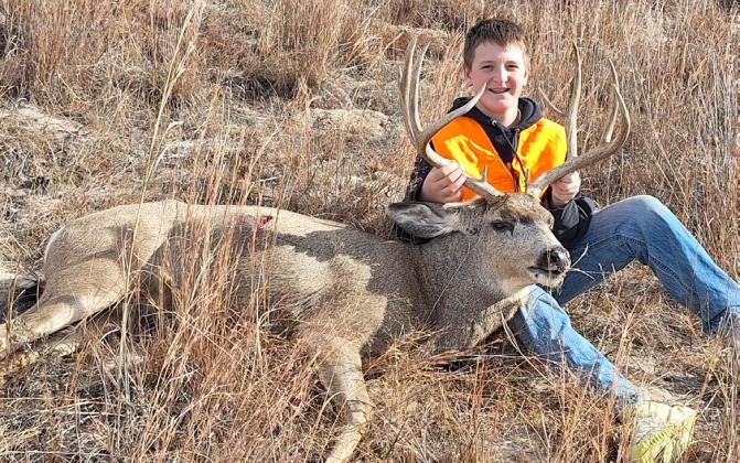 Hayden Deibler with his 5x5 mule deer last month.
