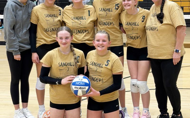 Sandhill Defenders, pictured back l-r: Helper Josie Morrow, Hope McIntosh, Lilly Morrow, Hadley Marsh, Ava Walz, Coach Barb McIntosh. Front: Paisley Ray, Ella Walz. courtesy photo