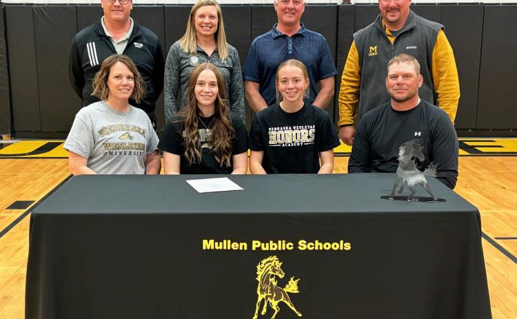 MHS senior Jadyn Andersen signed her letter of intent to play volleyball at Nebraska Wesleyan last Thursday, May 2. Pictured back, l-r: MHS Principal Mike Kvanvig, MHS Head Volleyball Coach Nichole Ourada, MHS Activities Director Phil Hoyt, MPS Superintendent Chris Kuncl. Front: Megan, Jadyn, Harper and Tim Andersen. Gerri Peterson