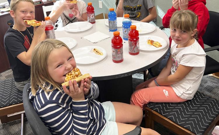 Pictured clockwise around the table from front left: Ella Walz, Eli Barnes, Ava Walz, Ava Kvanvig, Duke Miller, Aislynn Connealy. Brett Mauler