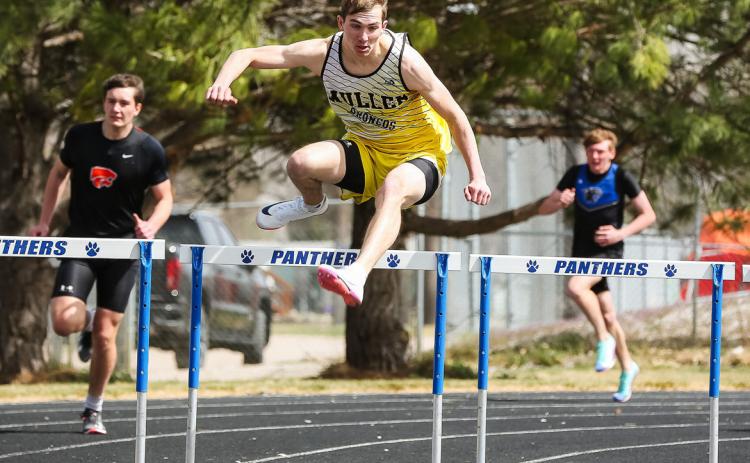 Cayden Hampton on his way to the gold in the 300 hurdles. Megan Andersen