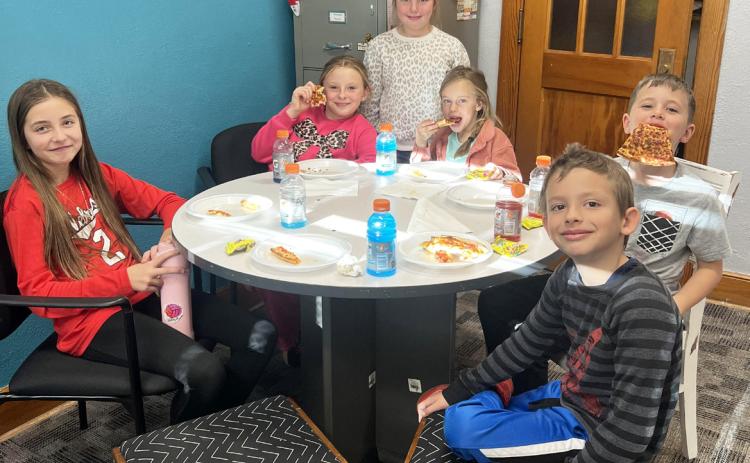Pictured clockwise around the table from the left: Lillian Ericksen, Sadie Hoyt, Aislynn Connealy, Emerson Phipps, Tate Phillips, Austin Smith. Brett Mauler