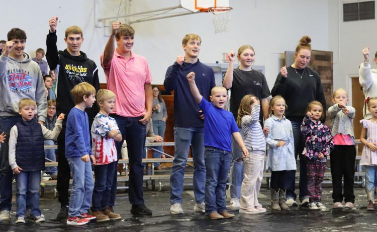 The Mullen seniors and kindergartners sang “Clap For Our Veterans” together at the Veterans Day program last week. Pictured back, l-r: Tate Kvanvig, Jaylon Forsen, Cayden Hampton, Jacob Walker, Alex Werner, Hayley Donohoe, Morgan Hassett, Trinity Marks. Front: Johnny Phillips, Martin Connealy, Clay Cribelli, Tate Seeley, Kane Simmons, Quinley Schmid, Emerson Phipps, Josey Boland, Harper Barnes, Stevie Johnson, Violet Stichka. Gerri Peterson