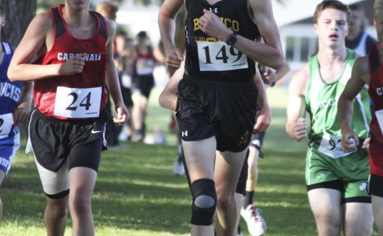 Top right: Alex Moore ran his first meet of the year last week after a knee injury last basketball season. Jill Coble