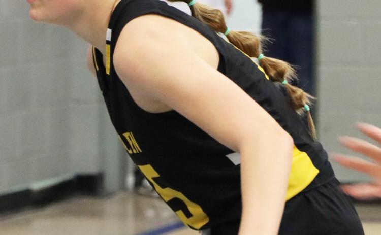 Brynne McCully plays defense at South Loup. Sue Licking