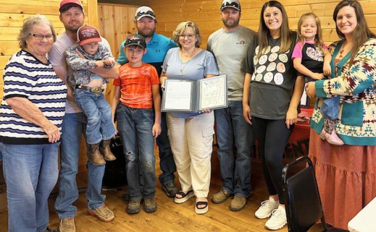 Judy Mulligan is pictured surrounded by her family at her retirement party. courtesy photo