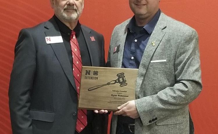 The Nebraska Association of County Extension Boards held their annual meeting and Legislative Day on March 28 in Lincoln. Mullen’s Ryan Ridenour (right) served as this year’s NACEB President and was recognized by Charles Stoltenow, Nebraska Extension Dean and Director. courtesy photo