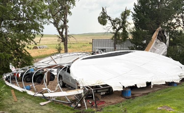 A tornado that hit Aaron and Liza Simonson’s place last Tuesday demolished their tarp building. Liza Simonson