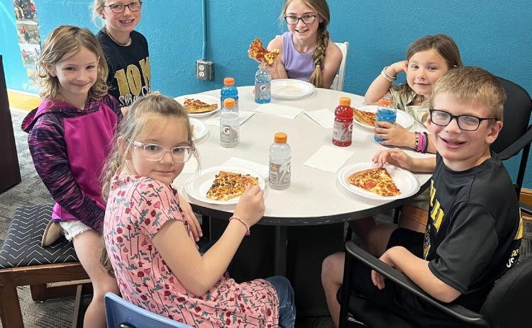 Clockwise around table from top left: Fallon Lee, Avery Vinton, Quinley Schmid, Cooper Ourada, Anna Hessin, Ryhme Pettit. Brett Mauler