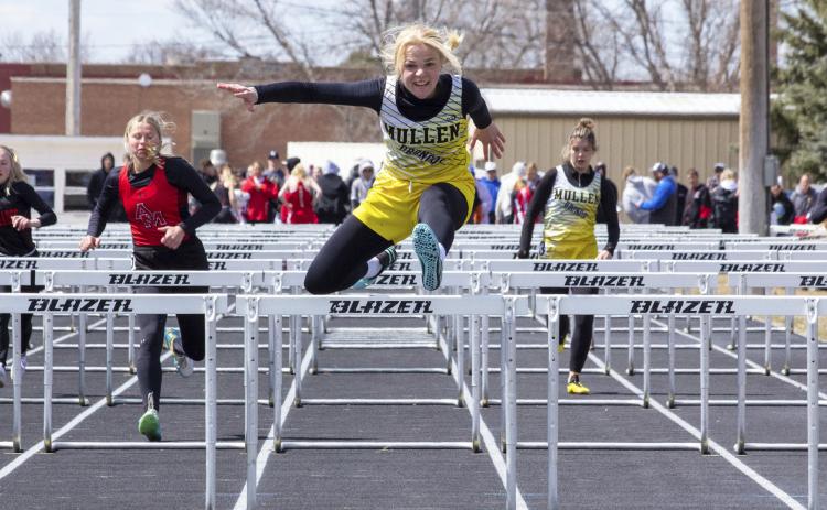 Tierston Moore and Medora DeNaeyer (back right) in the 100 hurdles last week in Arnold. Carolee Brown