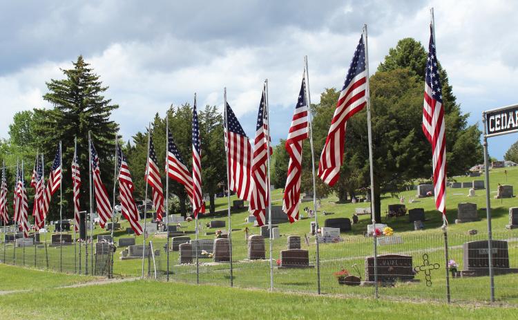 The flags flying at Cedarview Cemetery in Mullen over Memorial Day weekend. Every flag flown was once on a veteran’s casket, with the name of the veteran sewn on to the seam of the flag. Gerri Peterson