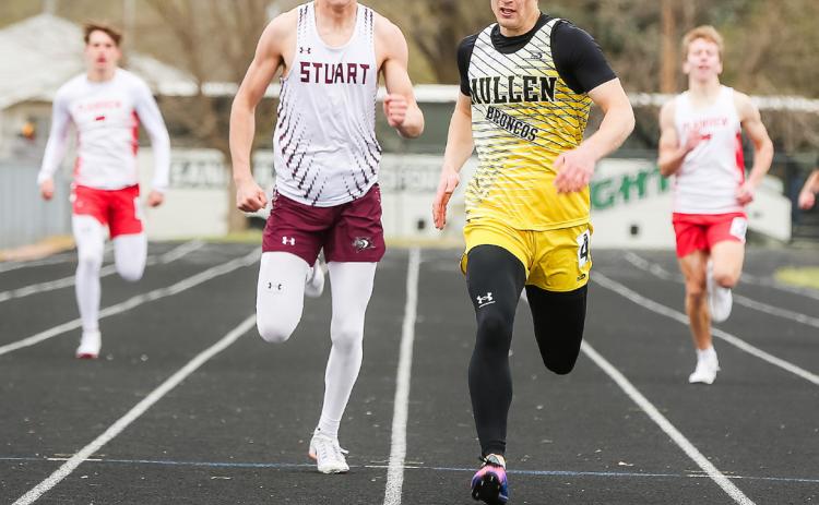 Alex Werner on his way to a gold medal in the 400. Megan Andersen Photography