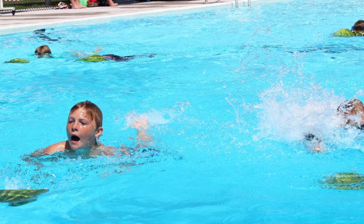Gus Wingebach edged out Collin Donohoe to win the 9-11 year old Watermelon Race. Gerri Peterson