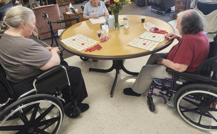 L-r: Ann Connell, Nadene Andersen and Peggy Barnt getting ready for Bingo.