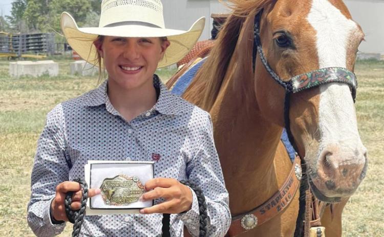 Brynne McCully with her All Around buckle in North Platte. Traci McCully