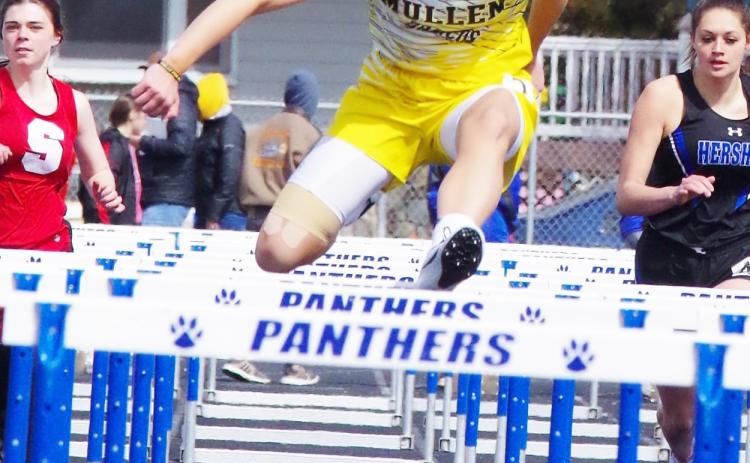 Samantha Moore on her way to the gold medal in the 100 meter hurdles at Hershey last Saturday.