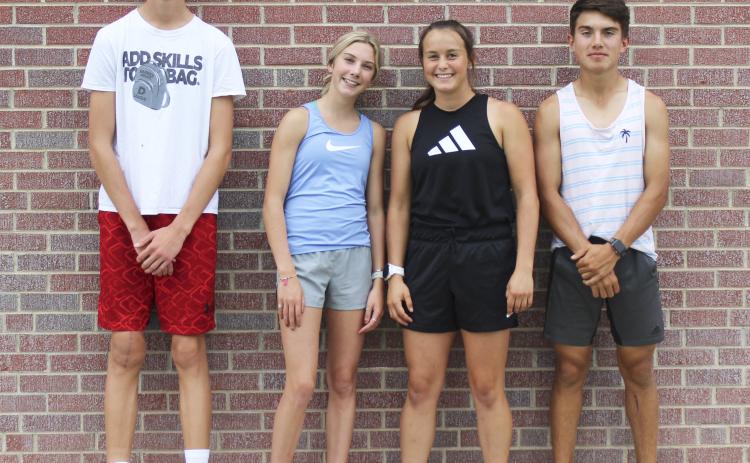 MHS Cross Country, l-r: Alex Moore, Peyton Paxton, Callie Coble, Trevor Kuncl. Gerri Peterson