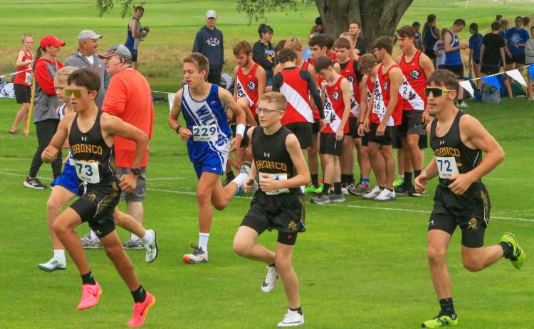 The high school boys warm up before last week’s race, l-r: Braylon Kuncl, Oakes Miller and Hunter Brown.