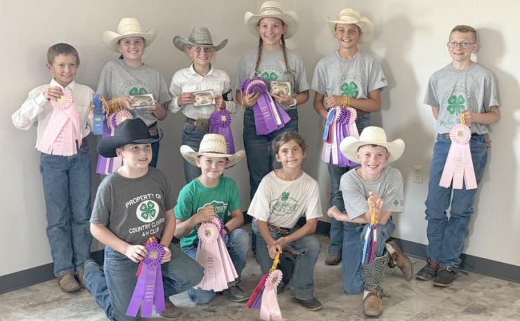 4-H horse competitors, back l-r: Grady Phipps, Audrabell Werth, Kendall Phipps, Hope Miller, Kaisley Phipps, Oakes Miller. Front: Zach Hicks, Tripp Jewell, Finley Mundorf, Duke Miller. Tami Miller