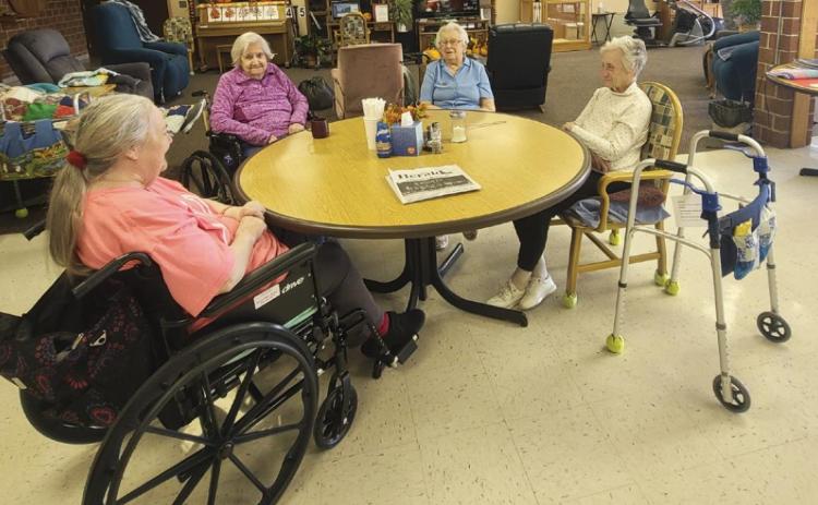 Current events with, l-r: Ann Connell, Marty Boyer, Nadene Andersen and Wanda Mackley.