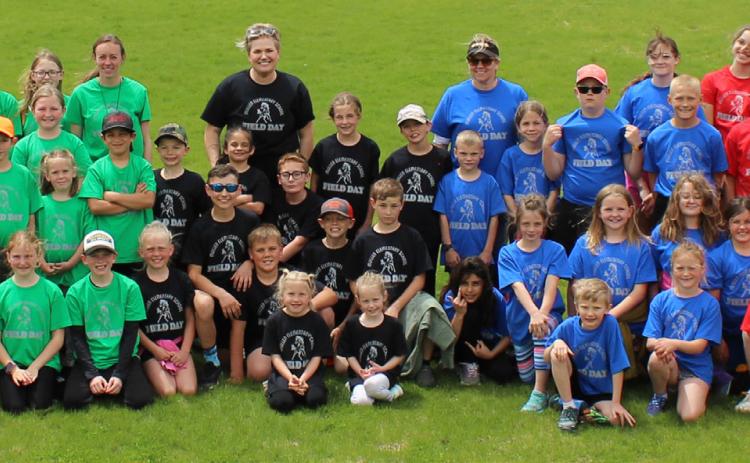 The Mullen Elementary Field Day was held last Tuesday, May 7. Pictured above in their team colors (which online subscribers can see) are students in grades K-6 who took part in the day.