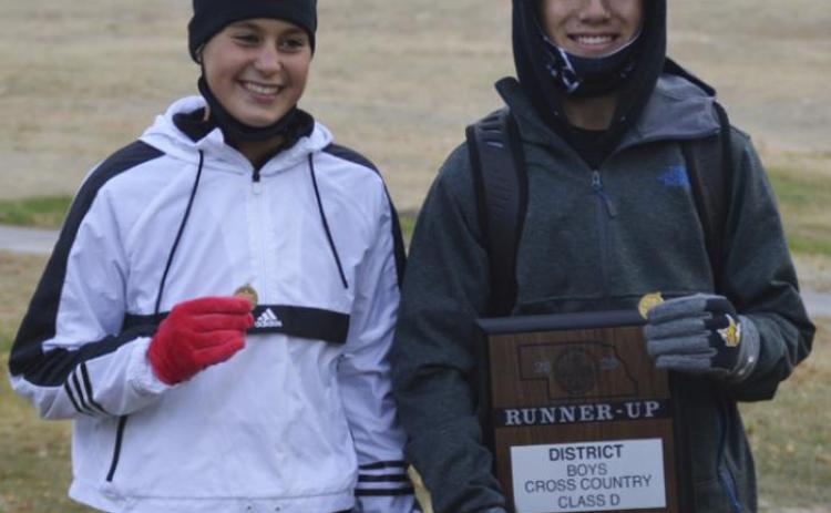 District D-6 Girls Champion Callie Coble, and Boys Champion Trevor Kuncl. Bri Moore