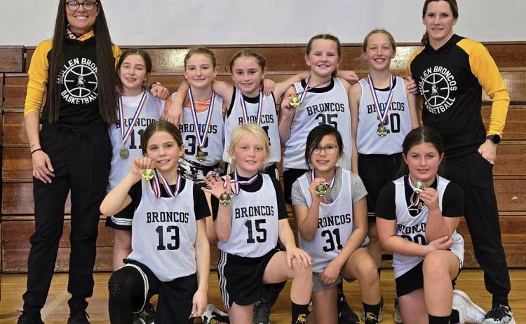 The Mullen 3rd/4th grade girls won their division at Hoops in the Hills last Saturday morning, Jan. 25. The girls tournament was held at the Lariat. Pictured back, l-r: Coach Katie Dent, Lillian Ericksen, Elle Gracey, Avery Vinton, Ella Walz, Emri Dent, Coach Callie Vinton. Front: Abbigail Mundorf, Daryl Deibler, Natalee Walker, Zandra Hebbert. Justa Deibler