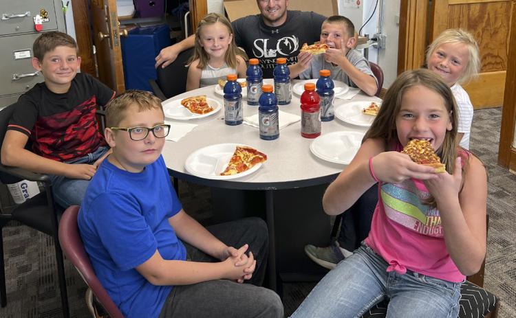 Pictured beginning with Mr. Mauler clockwise around table: Luke Cox, Danielle Peterson, Logan Moore, Cooper Cash, Colin Connealy, Sadie Hoyt. courtesy photo