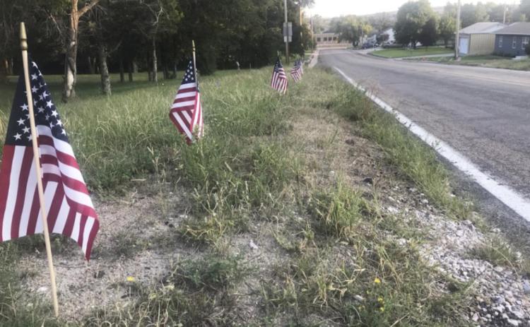 Photos don’t do the North Highway 97 flags justice! Drive by and see them yourself. Gerri Peterson
