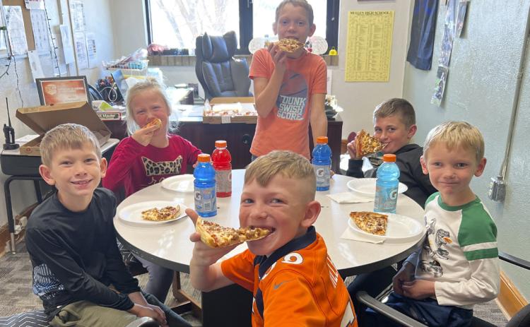 Sitting around the table starting from the left: Cooper Phillips, Danielle Peterson, Eli Barnes, Bronx Burney, Jaxson Barnes, Duke Miller. Brett Mauler