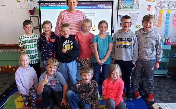 Ms. Brown with her second graders this year, back, l-r: Tate Phillips, Brogan Jewell, Jaxson Barnes, Anna Ridenour, Kinley Crisp, Cooper Ourada, Harrison Vinton. Front: Aurora Polt, Kayden Evans, Merick Lattin, Meyer Vinton.