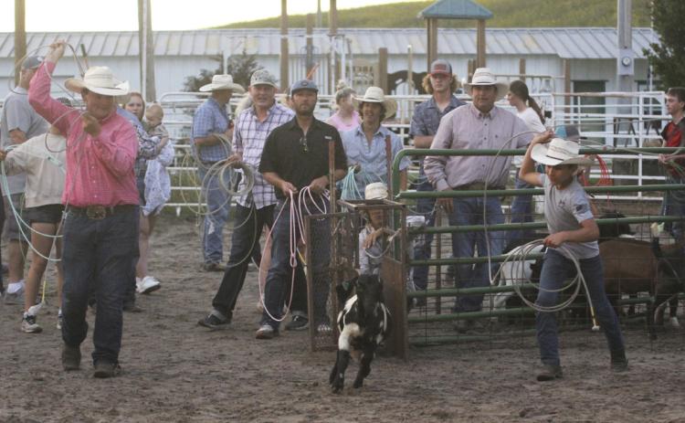 Owen Thorberg (left) and Gunner Brown take a turn in goat roping last Friday night. Winning first place and $800 was Zach Merritt and Cliff Bernal, 2nd - Zach Merritt and Maddie Merritt $600, 3rd - Josh Cox and Triston Nielson $400, 4th - Bryan Miller and Faith Miller, $200. Gerri Peterson