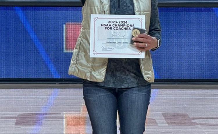 Last month the recipients of the inaugural 2023-2024 Nebraska School Activities Association Champions for Coaches award were announced. MHS cross country coach Janie Kuncl received the award for boys cross country. She received her award during the Class A Boys State Basketball semifinal game on Friday, March 8 at the Pinnacle Bank Arena in Lincoln. Congratulations! courtesy photo