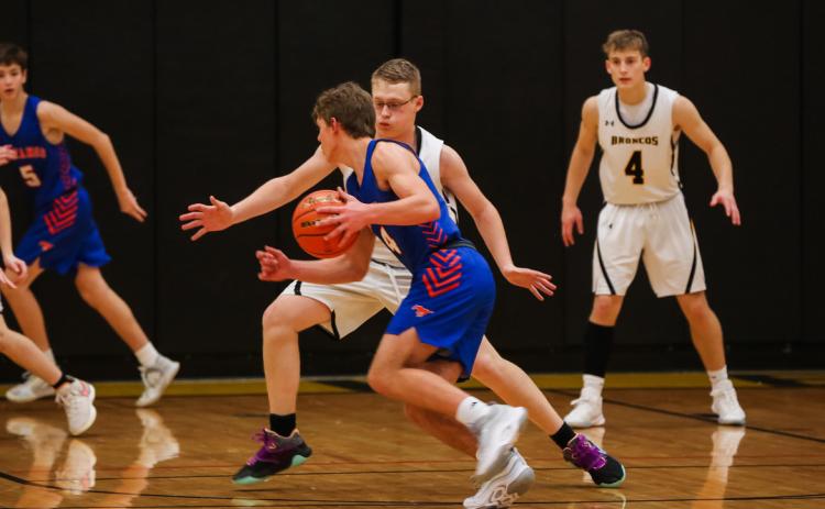 Daniel Wright on defense against Gordon-Rushville. Megan Andersen