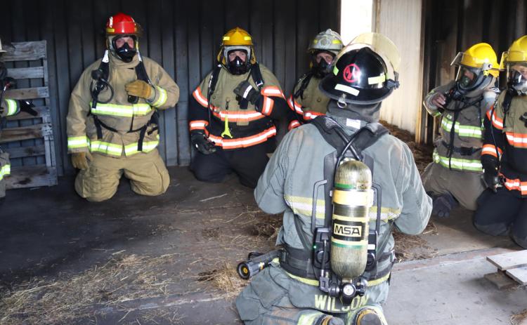Mullen native Tyrell Wilson (back to the camera) was an instructor for the interior fire and search and rescue training held at Mullen’s fire training center last Saturday, April 12. Wilson is the Fire Safety Lead at Gerald Gentleman Station at Sutherland. Firefighters from Mullen, Thedford, Stapleton, Tryon, Sandhills and Hyannis Volunteer Fire Departments took part in the training. Pictured l-r: Spencer Burk - Thedford, Huck Kemp - Tryon, Jason Brown and Nick Licking - Mullen, Wilson, a Stapleton fireman