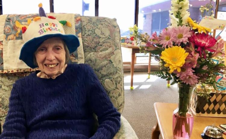 Sharon Carson with her beautiful flowers for her birthday.