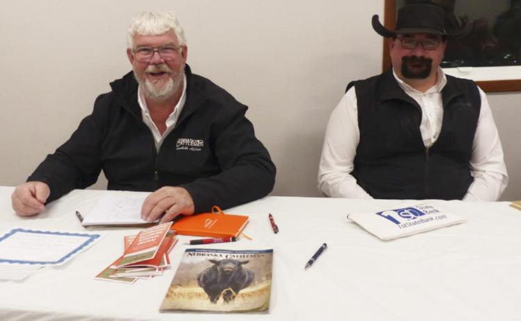 Nebraska Cattlemen Sandhills Affiliate President John Kraye (left) and Treasurer Kelly Kennedy at the registration table greeting those who braved the weather to make it to the 9th Annual NCSA Winter Ball. Terri Licking