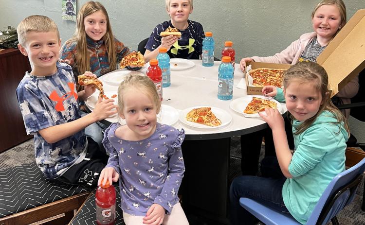 Pictured clockwise around the table from far left: Ryden Ourada, Olivia Cox, Jedd Kraus, Tatum Deibler, Aislynn Connealy, Aurora Polt. Brett Mauler