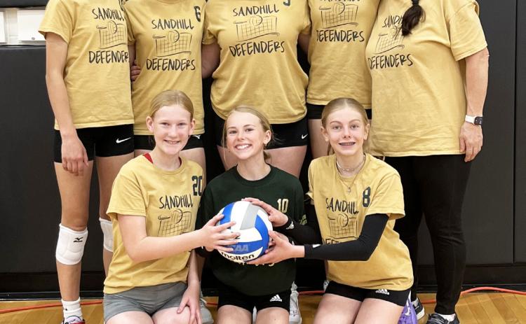 Sandhill Defenders, back l-r: Taylor Shaw (Merna), Karsyn Shaw (Merna), Harley Berghorst (Merna), Hadley Marsh, Coach Barb McIntosh. Front: Kayzie Pelster (Merna), Ayden Lee, Kendall Phipps. courtesy photo